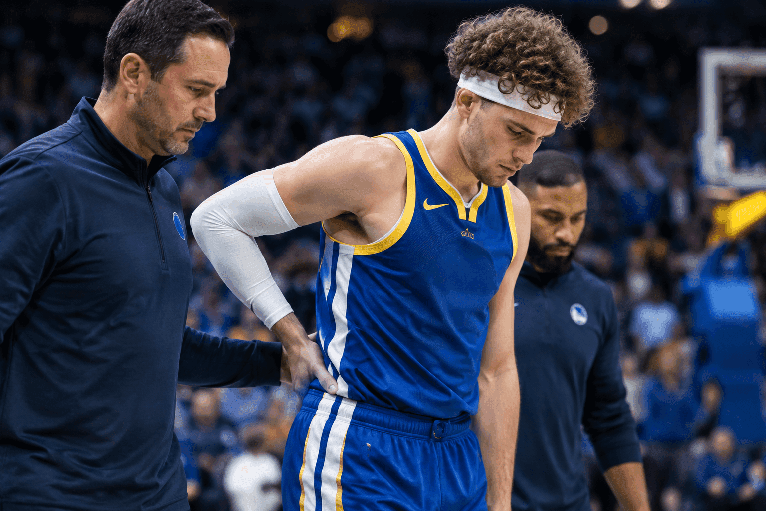 Editorial sports image for Brandin Podziemski Exits Early With Back Injury, Leaving Warriors Scrambling