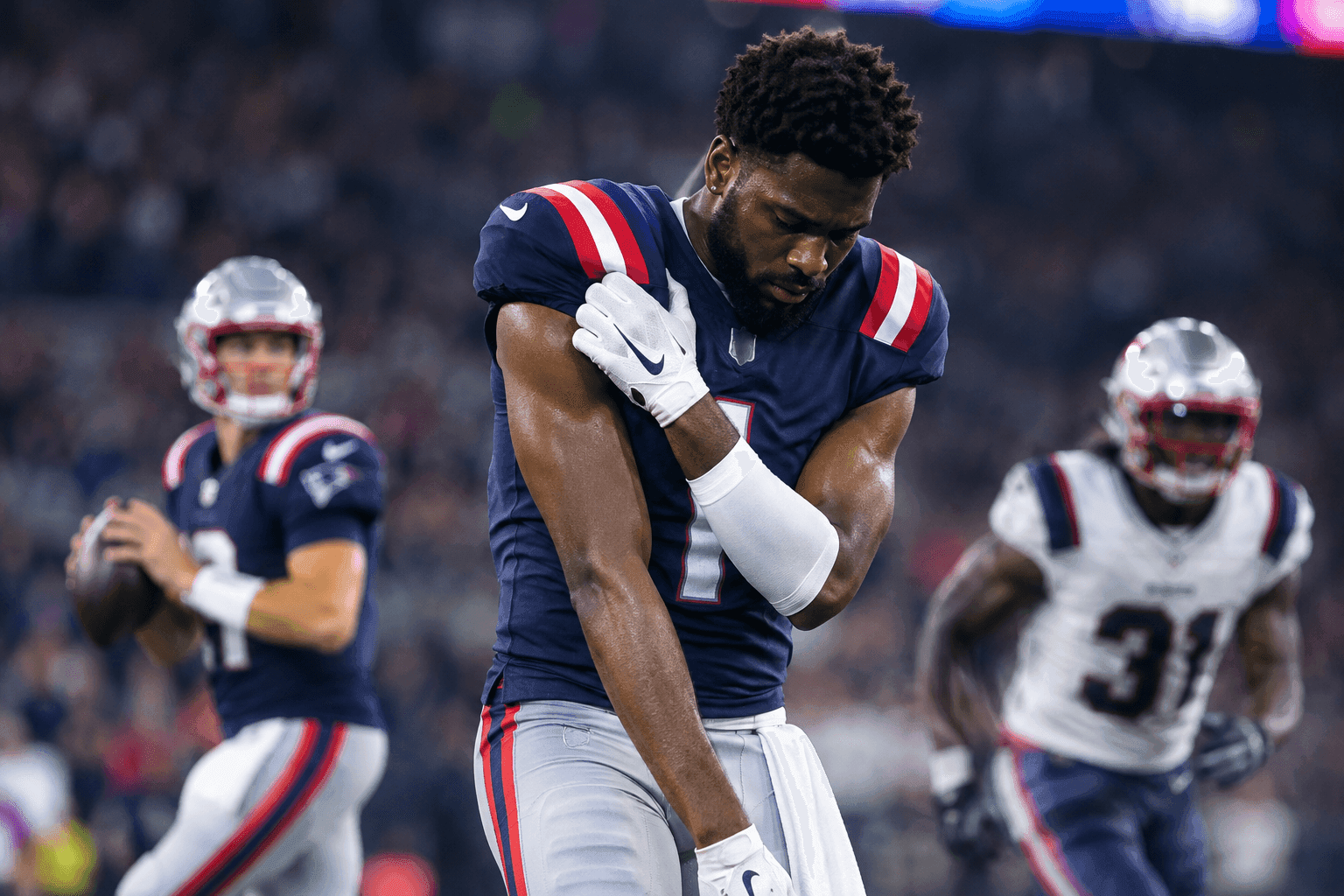 Editorial sports image for Romeo Doubs Hits IR After Touchdown Catch, Patriots Promote Elliott Davison