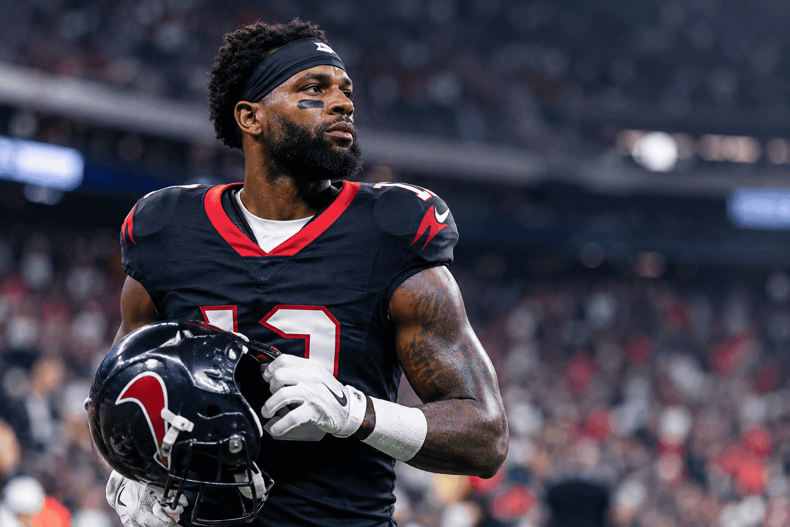 Editorial sports image for Nico Collins' Hamstring Just Sent a Shiver Down the Spine of Every Texans Fan