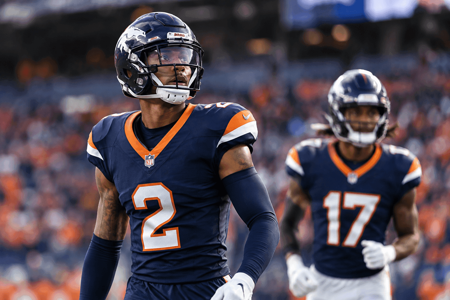 Editorial sports image for Broncos Dodge Disaster as Pat Surtain II and Pat Bryant Avoid Serious Ankle Injuries