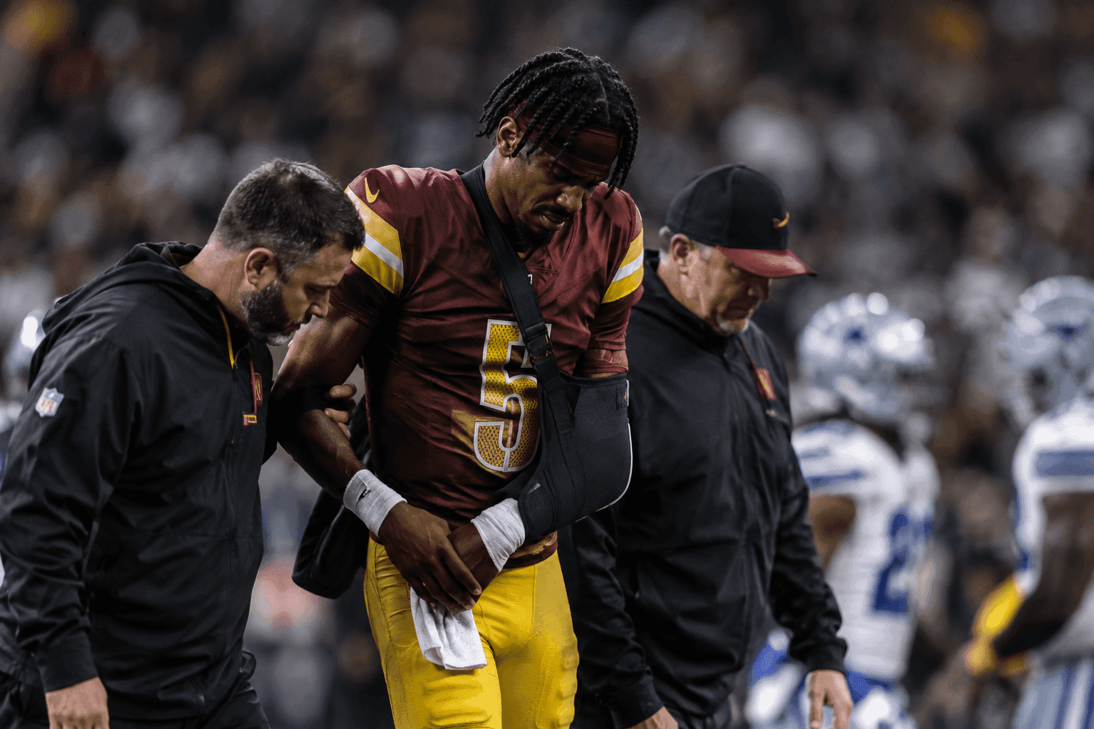 Editorial sports image for Dan Quinn's Blowout Blunder Costs Jayden Daniels Another Month
