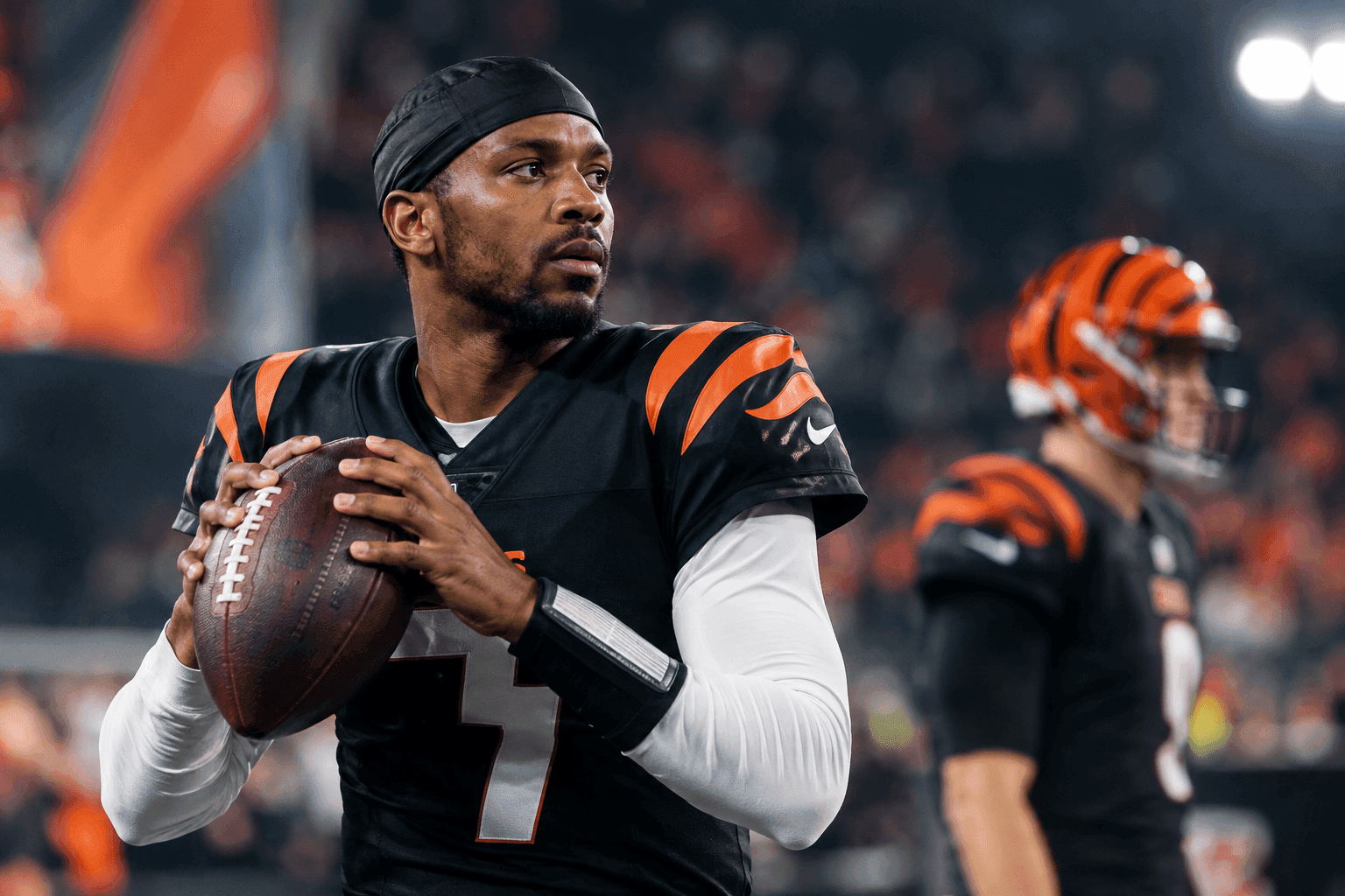 Editorial sports image for Bengals Elevate Josh Johnson as Joe Burrow's Back Tightness Triggers Panic Alarms