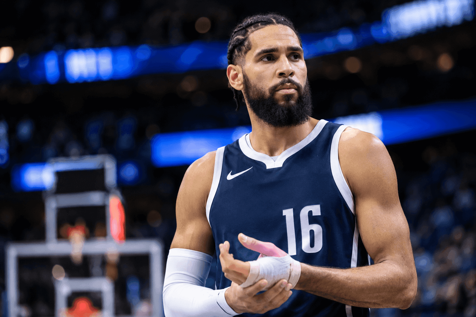 Editorial sports image for Caleb Martin's Thumb Sprain Keeps Him Sidelined for Saturday