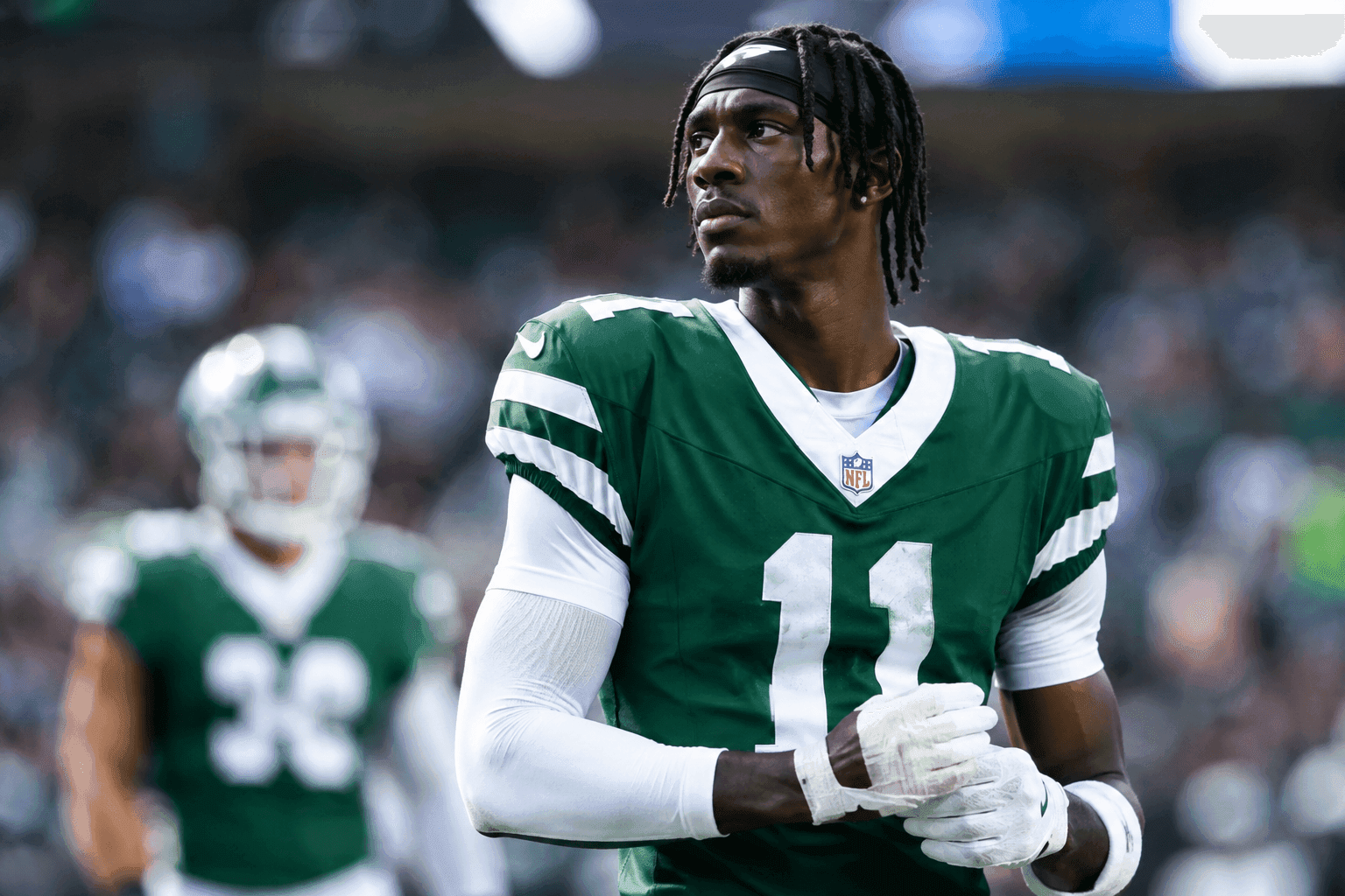 Editorial sports image for Adonai Mitchell’s Practice Jersey Mishap Leaves Jets Passing Attack in Shambles