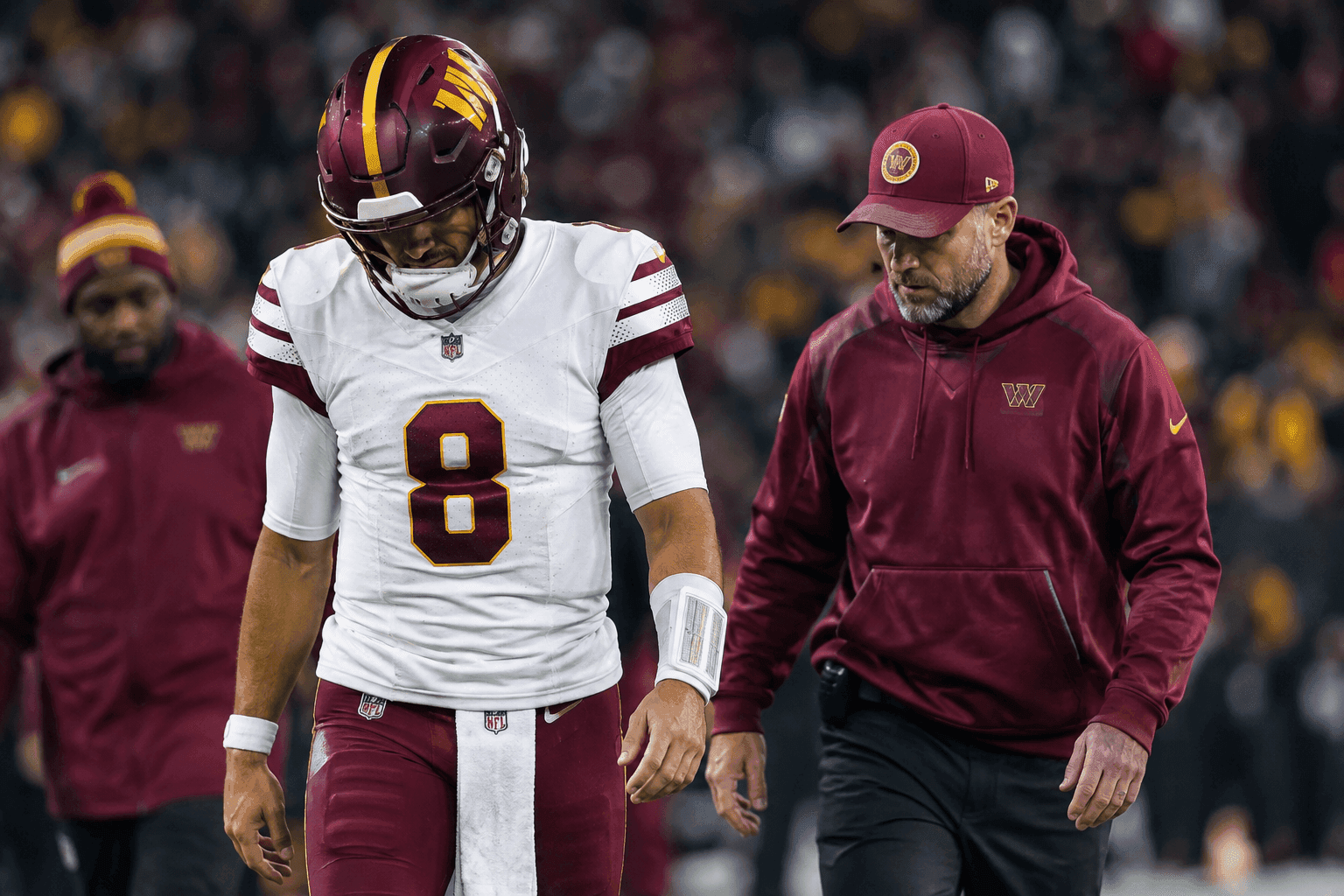 Editorial sports image for Marcus Mariota Exits With Injury, Handing Commanders Offense to Athan Kaliakmanis