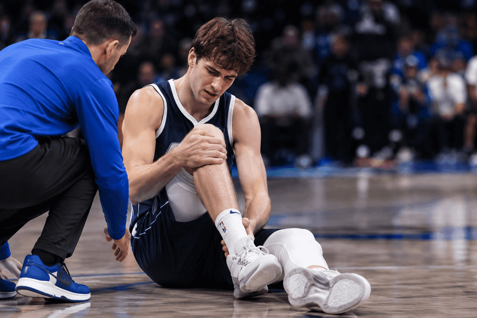 Editorial sports image for Mavericks Rookie Sergio De Larrea Exits Monday With Knee Injury
