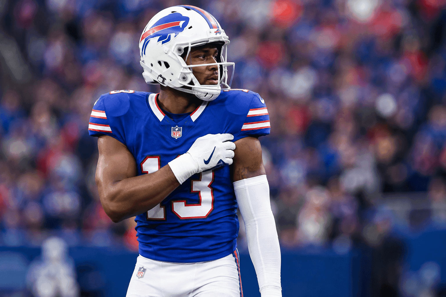 Editorial sports image for Bills WR DJ Moore Questionable to Return with Shoulder Injury Against Patriots