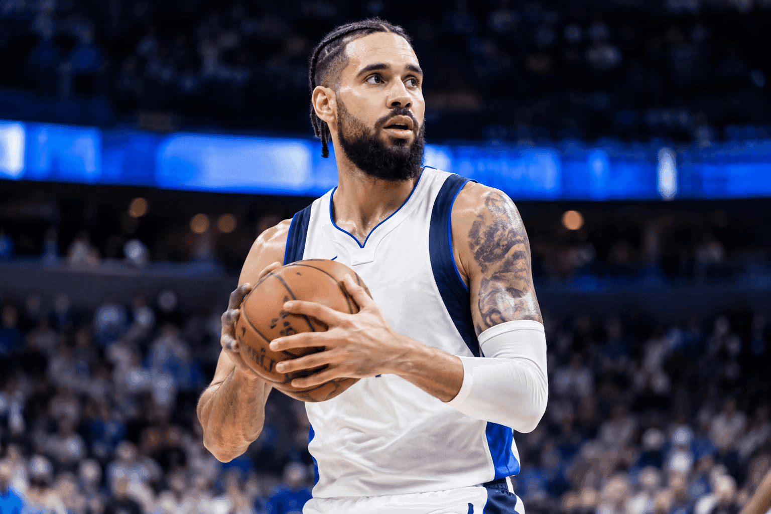 Editorial sports image for Caleb Martin Shakes Off Thumb Injury, Cleared for Wednesday's Mavericks Game