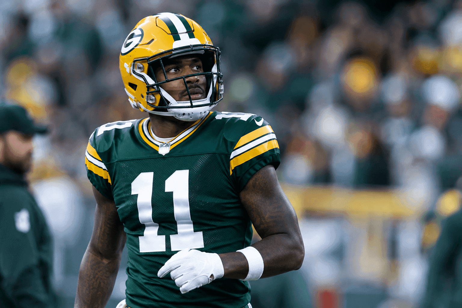 Editorial sports image for Jayden Reed's Scary Back Injury Turns Packers' Win Into a Waiting Game