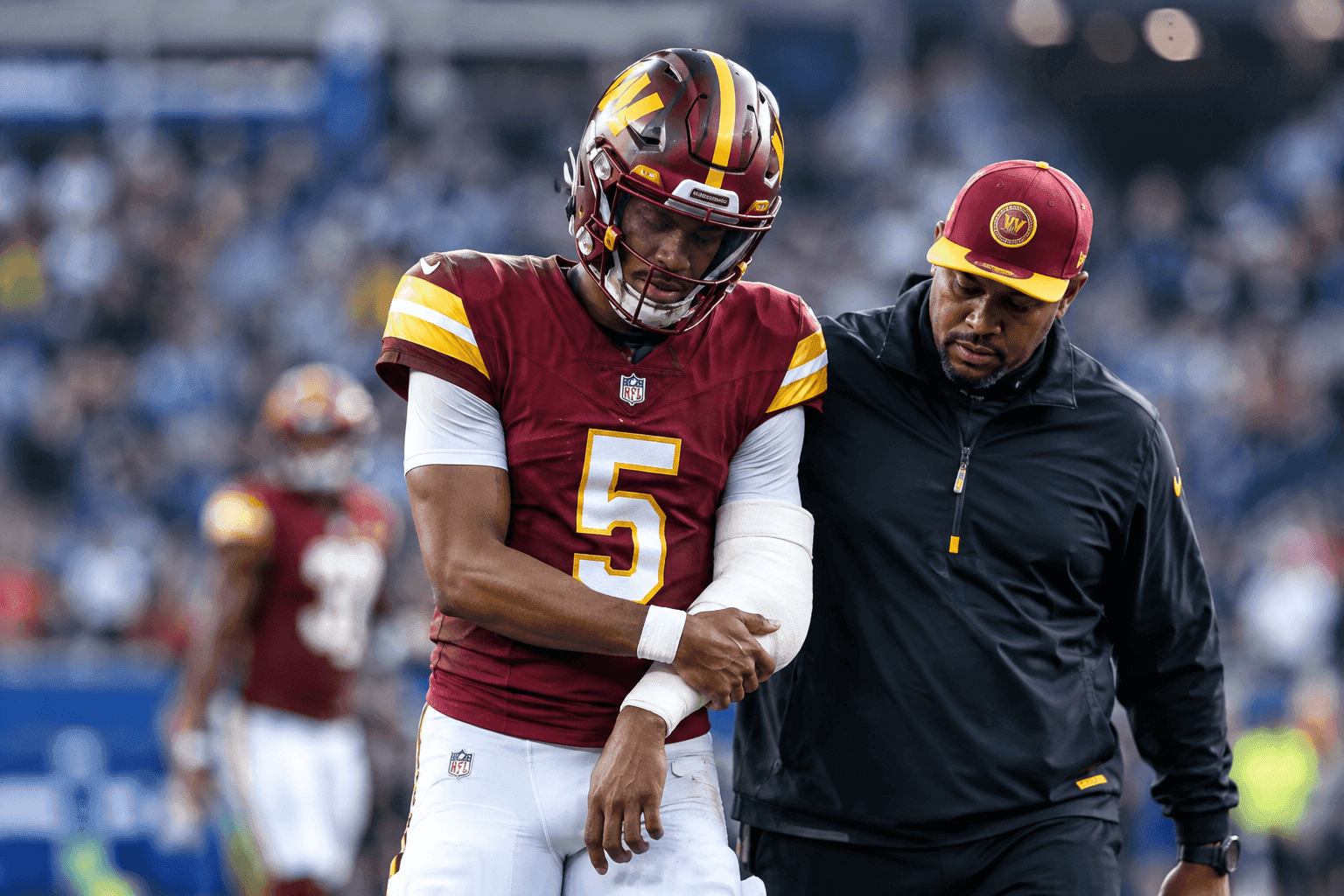 Editorial sports image for Jayden Daniels Dislocates Left Elbow Again Because Washington Can't Have Nice Things