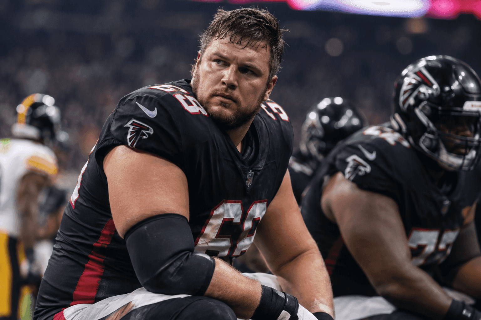 Editorial sports image for Falcons Star OL Chris Lindstrom Enters Concussion Protocol After Rough Opening Loss