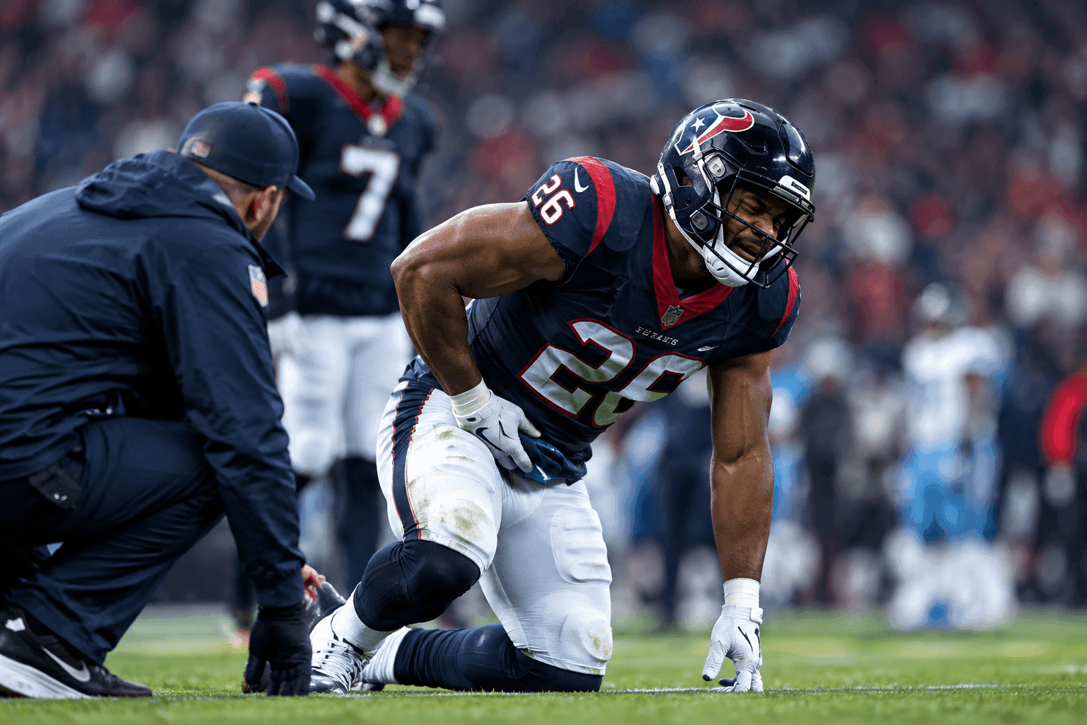 Editorial sports image for David Montgomery Questionable With Groin Injury Amid Texans-Titans Rock Fight