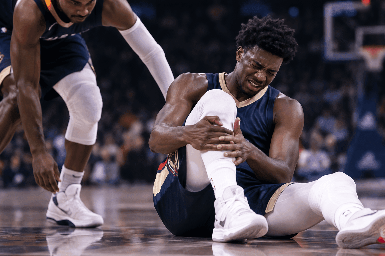 Editorial sports image for Yves Missi Sidelined After Taking a Zion Williamson Wrecking Ball to the Knee