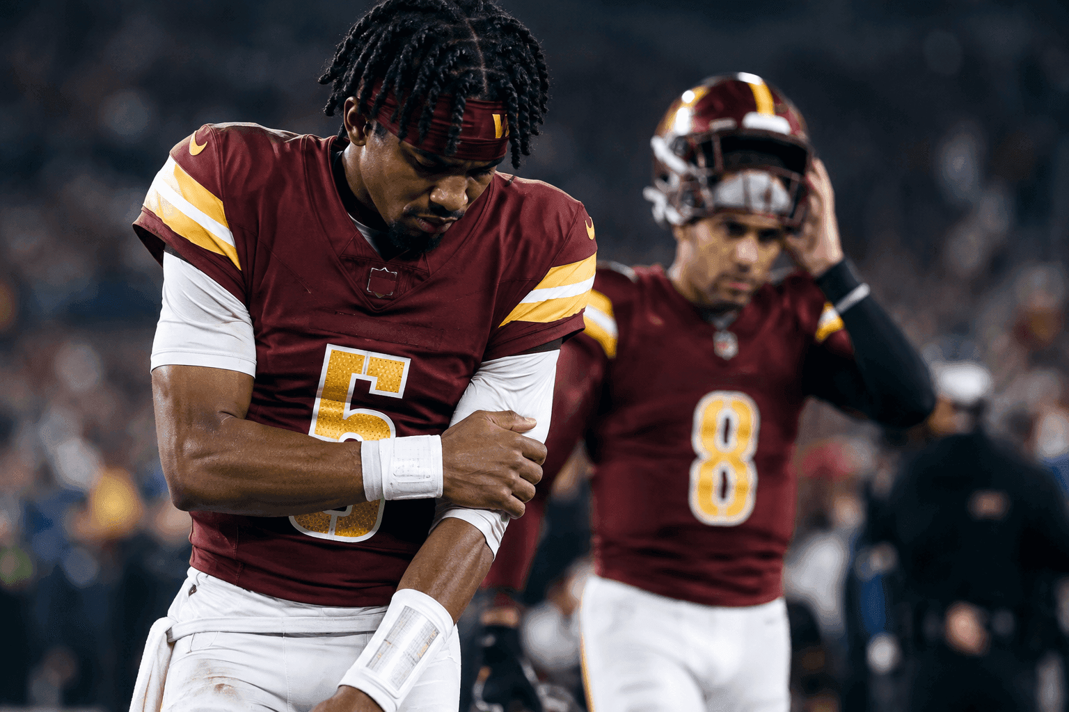 Editorial sports image for Jayden Daniels Suffers Another Brutal Elbow Injury as Commanders' Nightmare Repeats