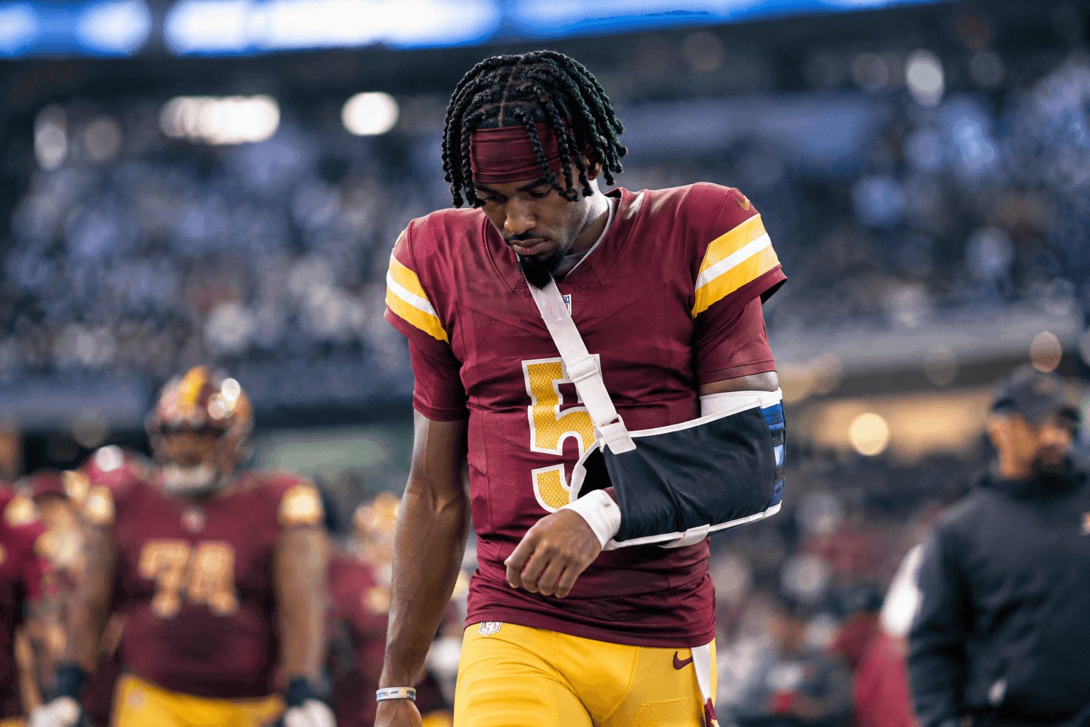 Editorial sports image for Jayden Daniels Ruled Out With Another Left Elbow Injury Against Dallas