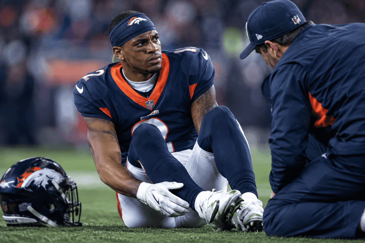 Editorial sports image for Broncos Lose Patrick Surtain II to Ankle Injury for Expected Two Weeks