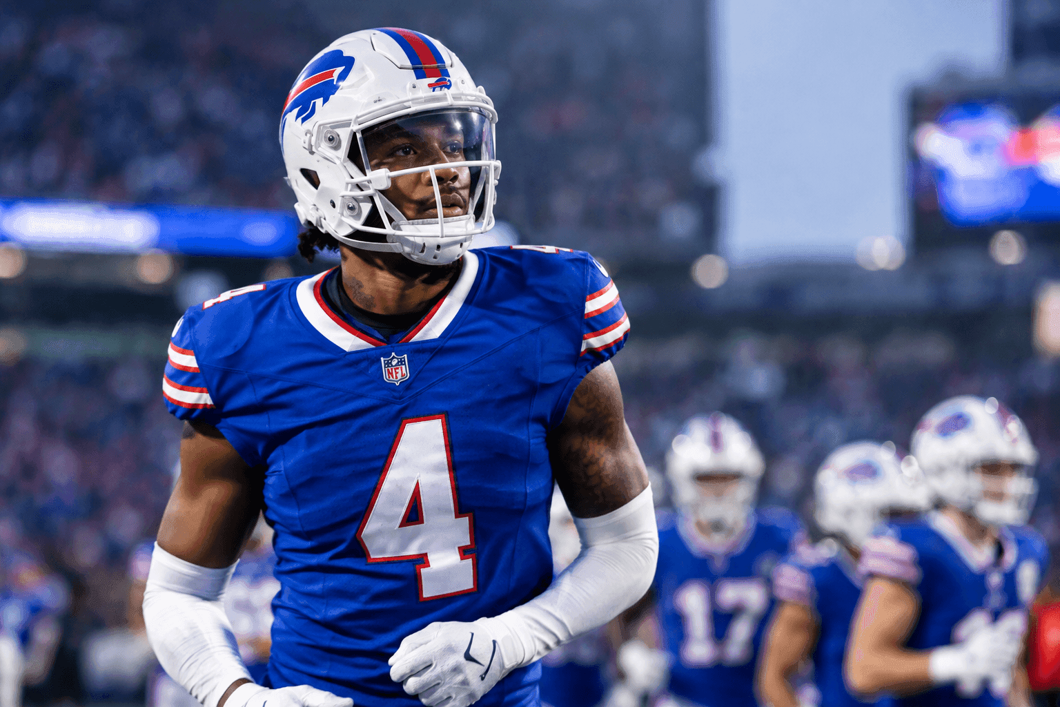 Editorial sports image for DJ Moore's Shoulder Injury Leaves Bills Guessing Ahead of Chargers Matchup
