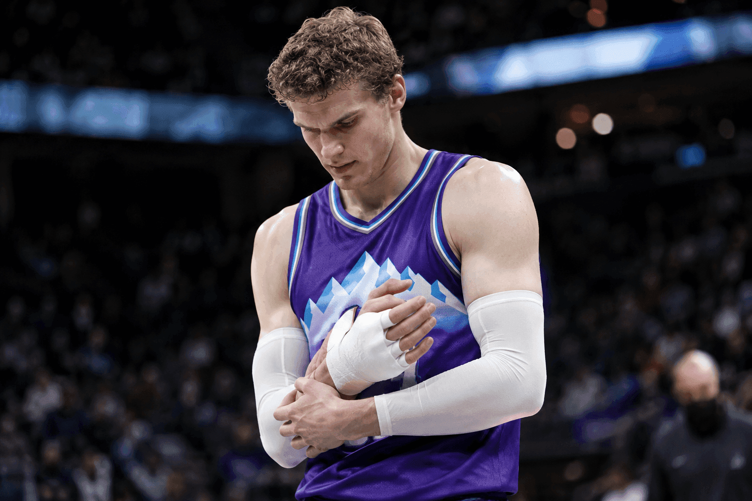 Editorial sports image for Lauri Markkanen Heads to Locker Room with Hand Injury as Jazz Medical Bill Grows