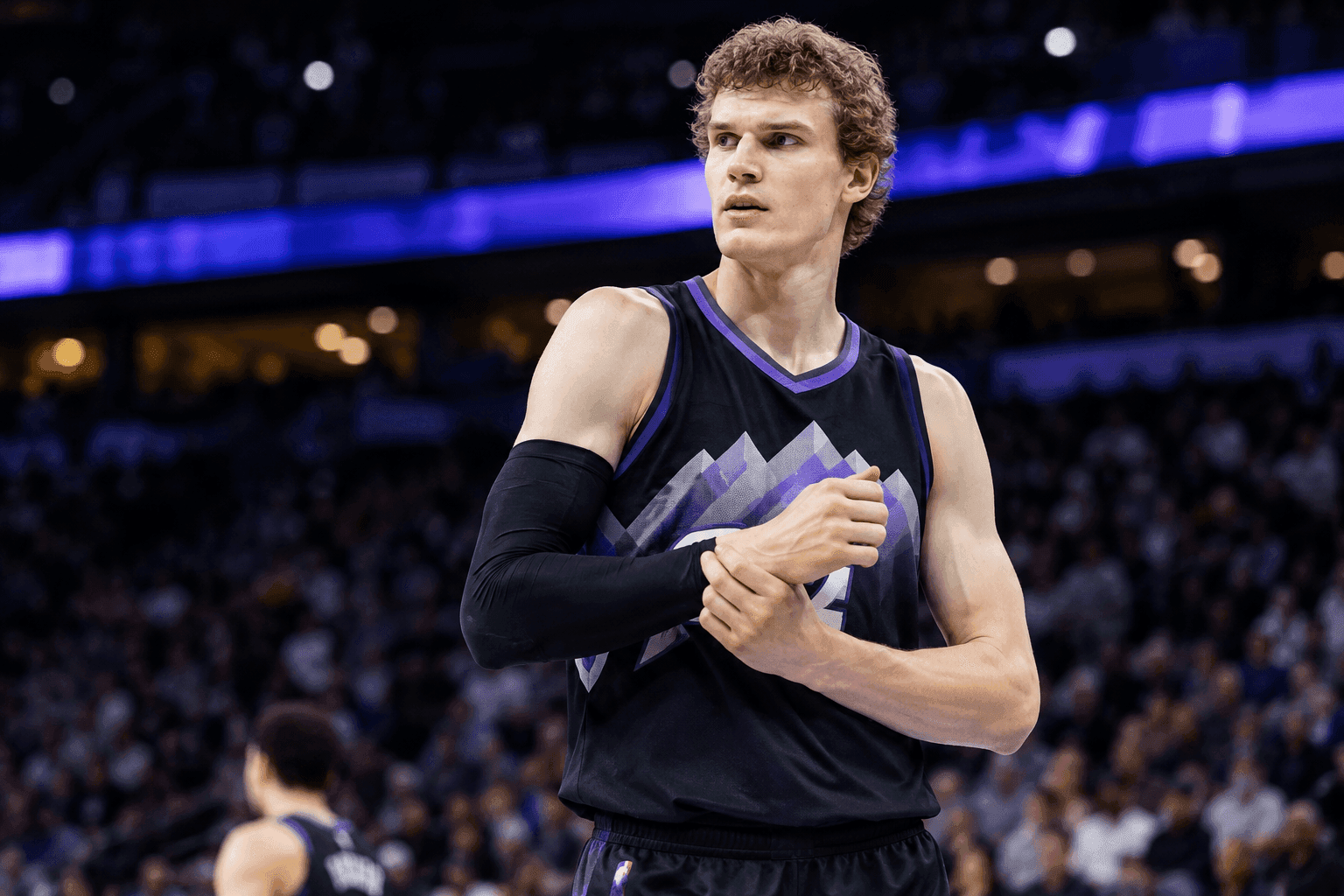 Editorial sports image for Lauri Markkanen Dodges Major Injury, Listed as Day-to-Day with Sprained Wrist