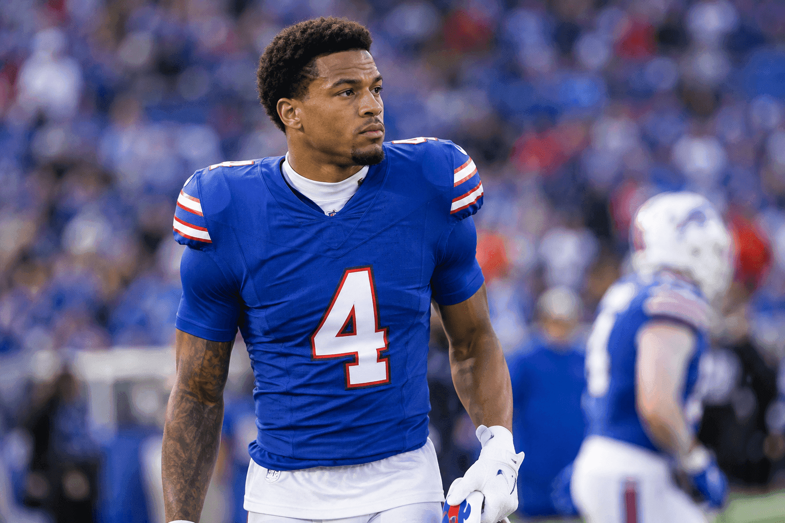Editorial sports image for DJ Moore's Shoulder Injury Spells Trouble for Bills Ahead of Raiders Matchup