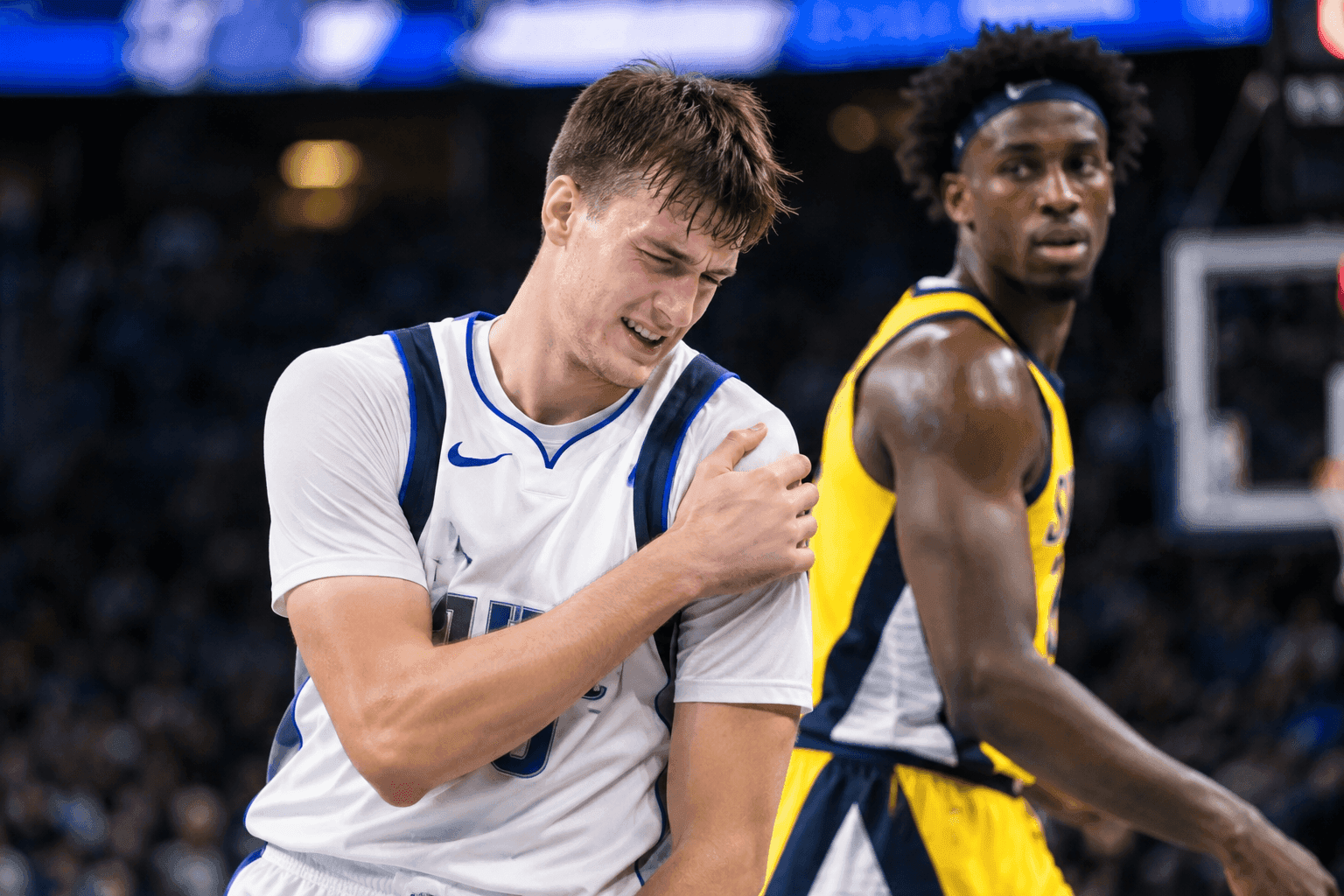 Editorial sports image for Cooper Flagg Exits With Shoulder Injury After Flagrant Foul From Aaron Nesmith
